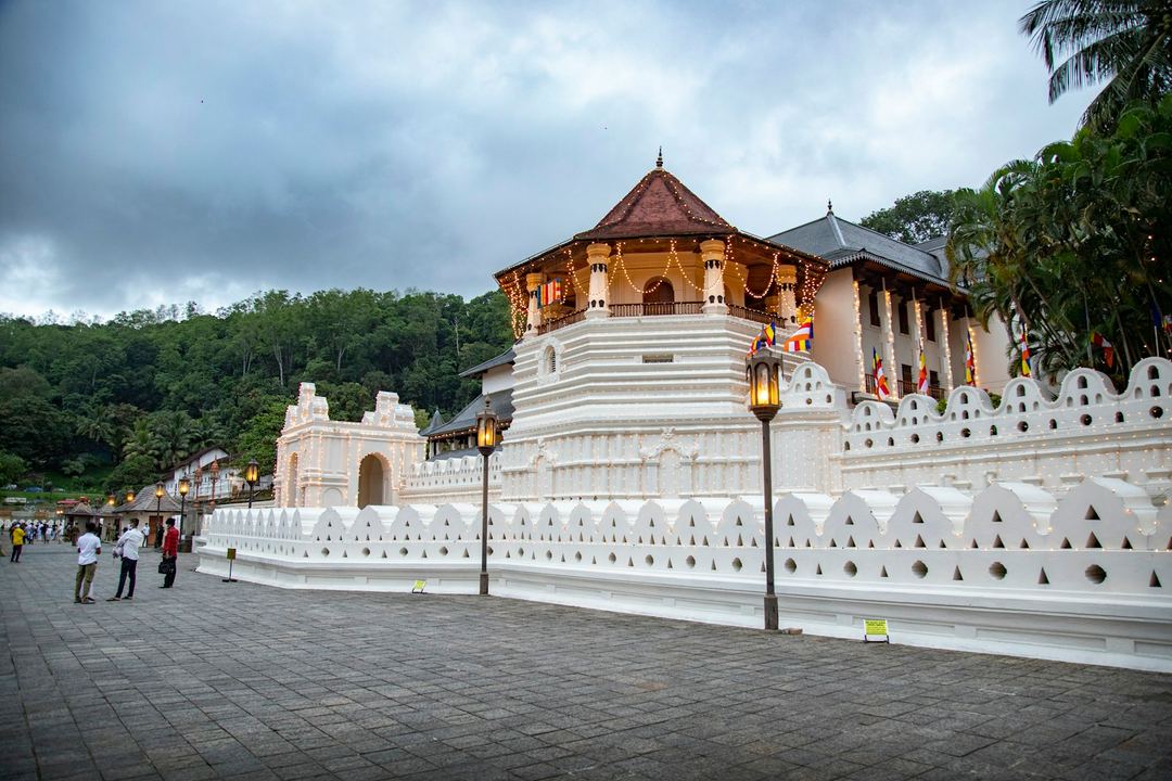 The white walls and octagonal pavilion of the Temple of the Tooth in Kandy.
